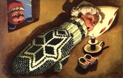 Julekort. Ubrukt. Et sovende barn ligger i en vott. Ved side