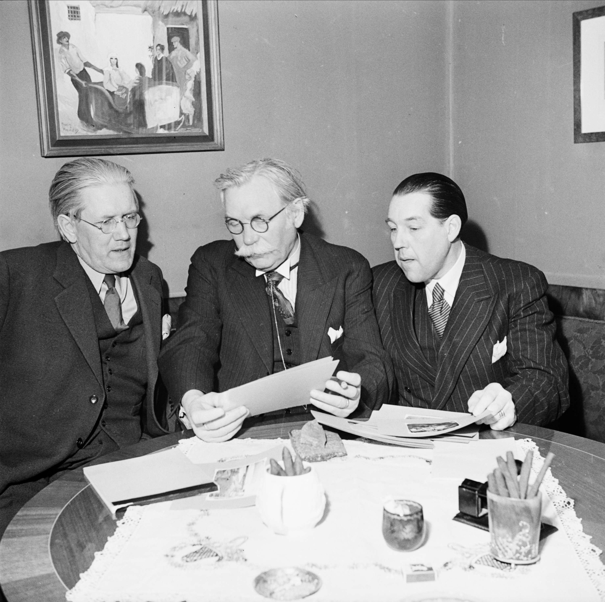 Professor Björn Collinder med två herrar