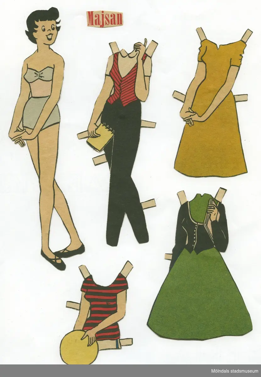 Pappersdocka med kläder, urklippt ur tidning på 1950-talet. Docka och kläder är märkta "Majsan" på baksidan - dockans namn. Dockan föreställer en ung kvinna med kort, svart hår, iklädd axelbandslös behå, underbyxor och skor. Garderoben består av två klänningar, två set med kjol och tröja/jacka, tre set med byxor (korta och långa), två kappor och hattar. Docka med kläder förvaras i en gul kartong (L: 300, B: 190, H: 20 mm) med texten "Art 330/42, Storlek 40/105, Färg vit" på kortsidan. I denna förvaras ytterligare en pappersdocka (MM 04684).