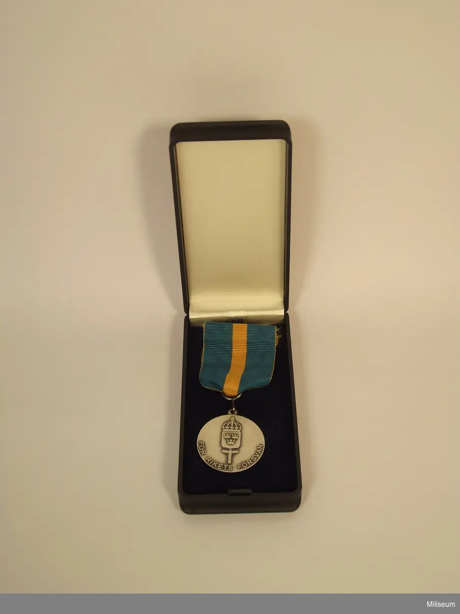 Medalj för genomförd värnpliktstjänstgöring, med tillhörande ask.