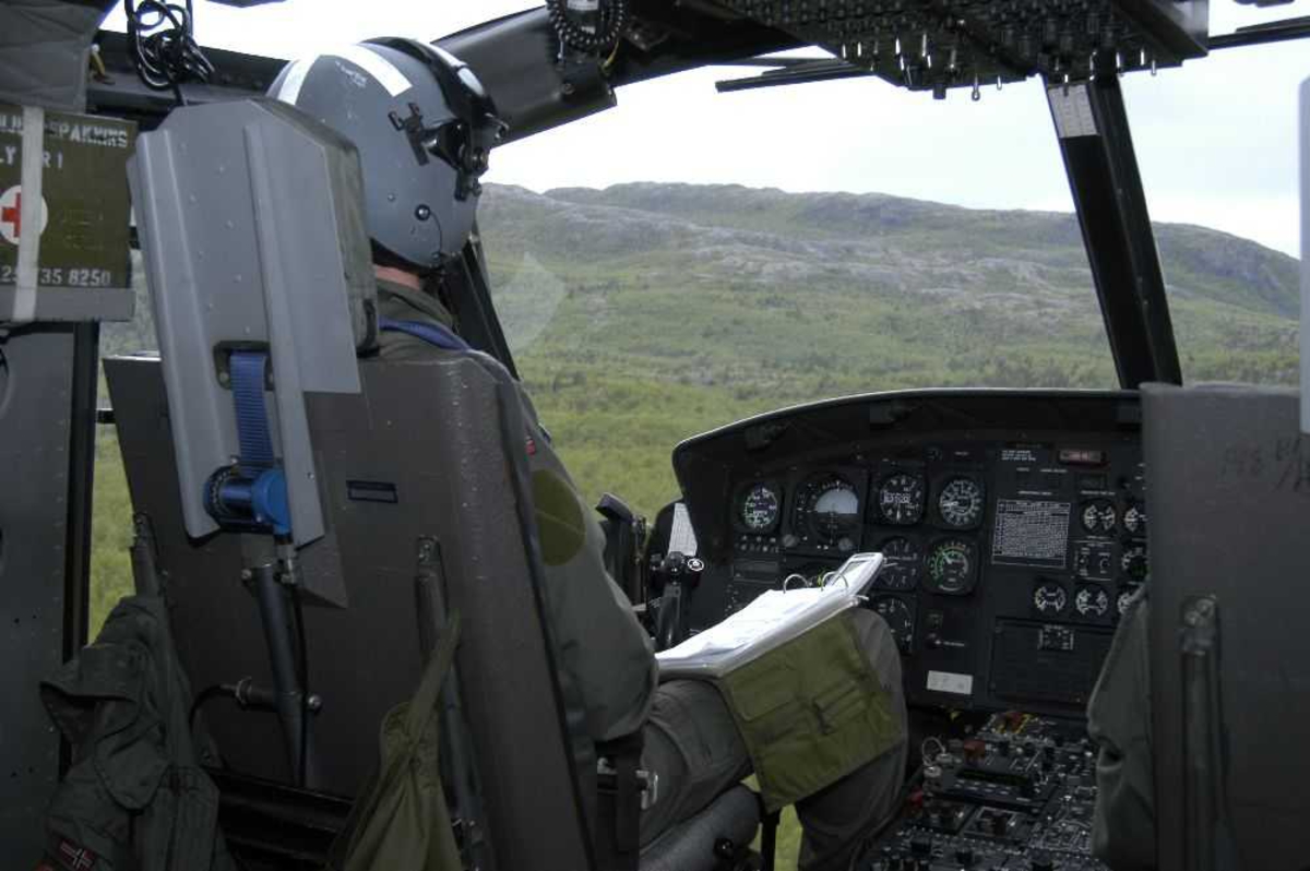 Flyger (pilot), inne i cockpit.