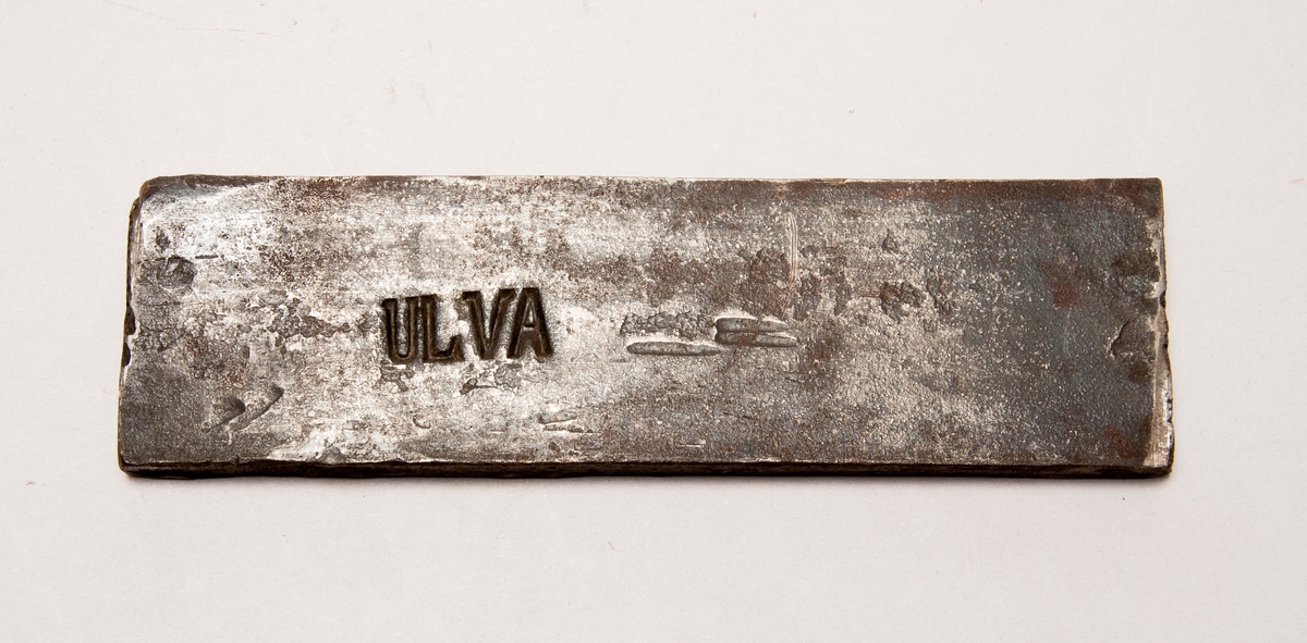 Järnstämpel från Ulva. Har texten "ULVA" på sig.