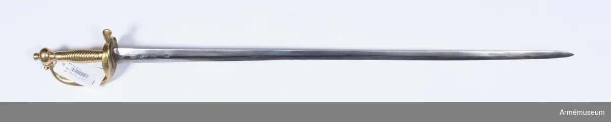 Grupp D II.
Klingans bredd vid fästet är 32 mm. Fästet är till en huggare  m/1748. Klingan är en nedslipad karolinsk infanteriklinga. På  parerplåten är den märkt "MORELL".