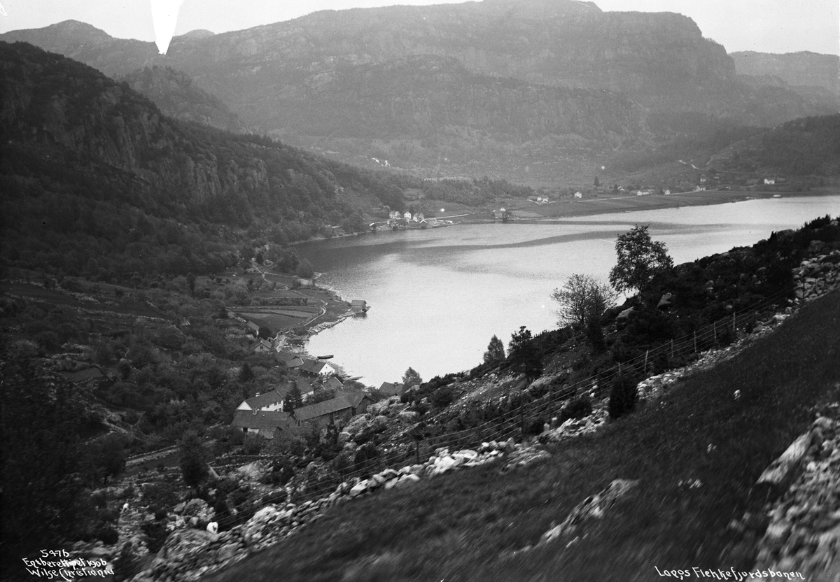 Loga (tettsted og vann) sett fra Flekkefjordbanen. Fotografert i juni 1906.