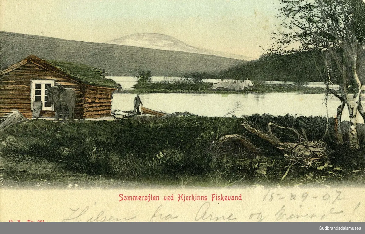 Håndkolorert postkort. Ved Kvitdalsvatnet på Dovrefjell. "Sommeraften ved Hjerkinns Fiskevand."
