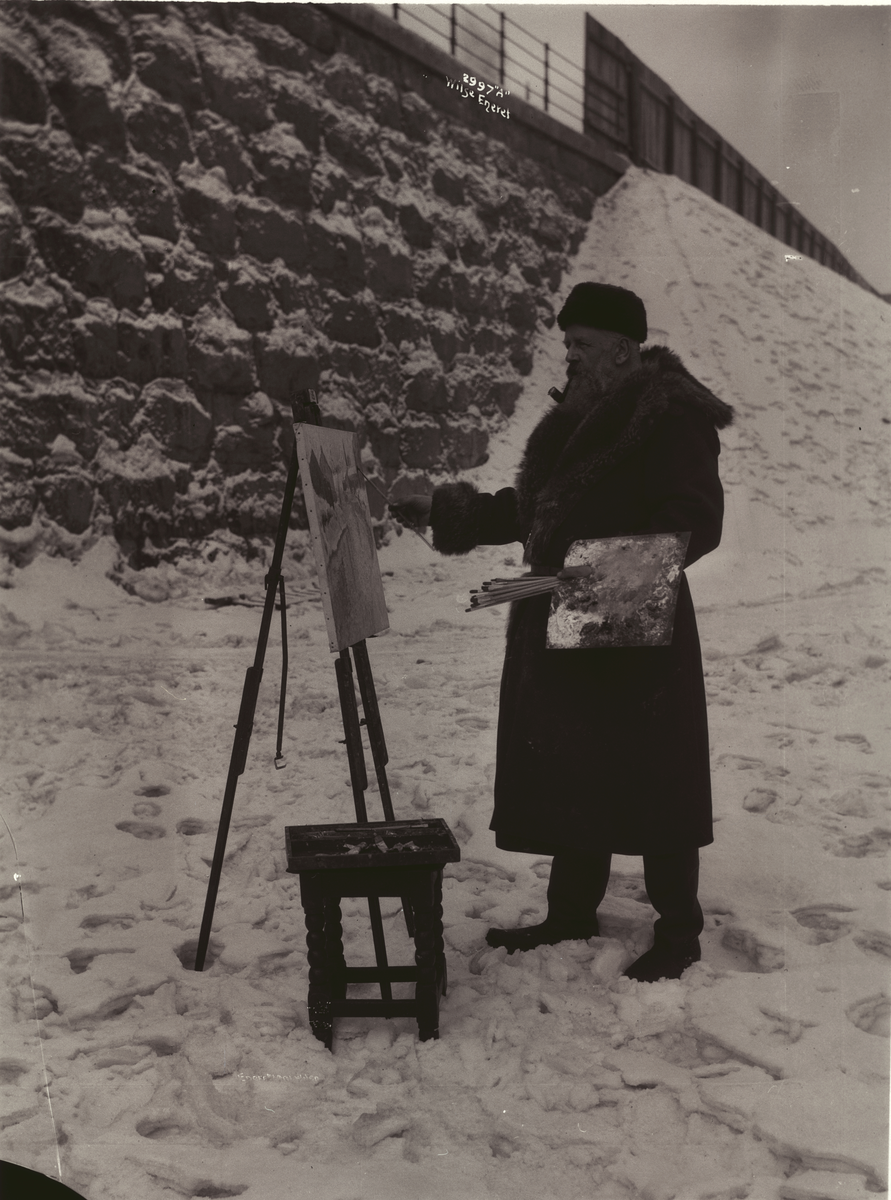 Fritz Thaulow maler ute i vinterland