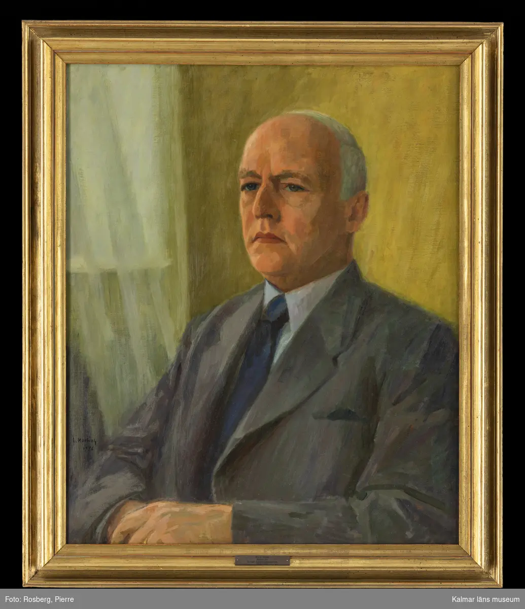 Porträtt föreställande Nils G. Ohlson som var verksam som rektor på Rostads folkskoleseminarium i Kalmar 1945-1957.
