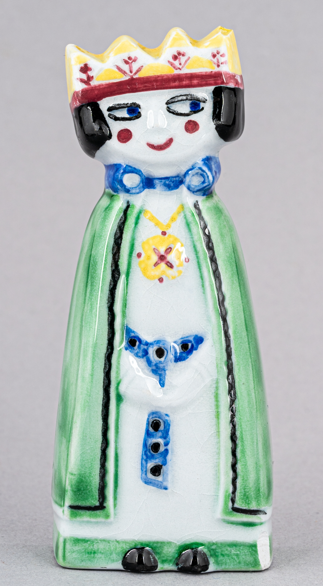 Figurin i flintgods, Prins, formgiven av Dorothy Clough 1955. Kan grupperas med två andra figurer av Clough från samma år; Kung och Drottning.