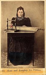 63. Kone med Langleig fra Valders.