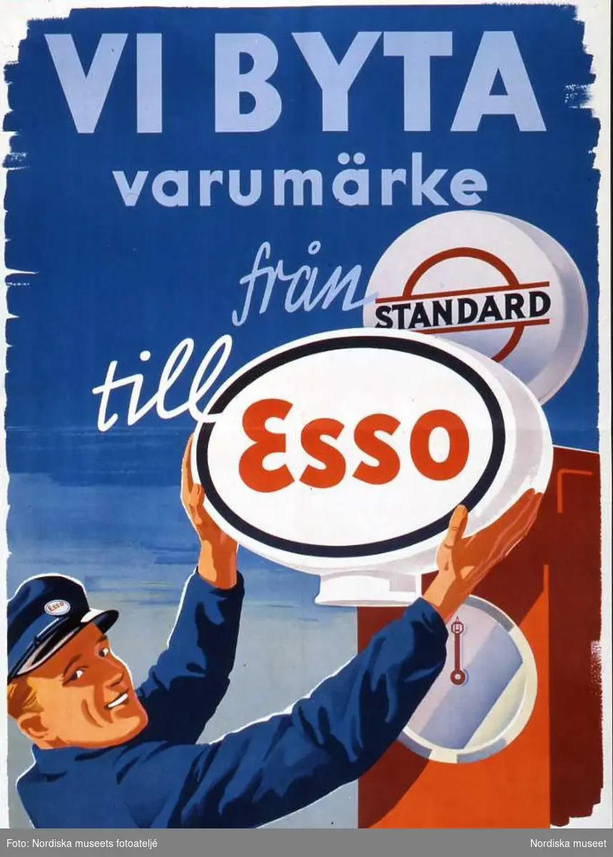 Reklamskylt för bensinbolaget Esso. "Vi byta varumärke från STANDARD till ESSO"