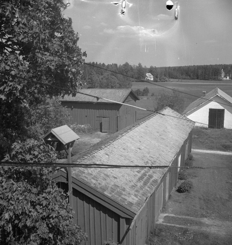 Bostadshus och byggnader.
27 juni 1958.