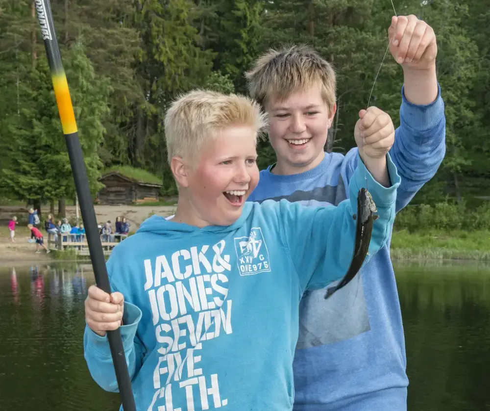 Happy fishermen during the event Forest and water