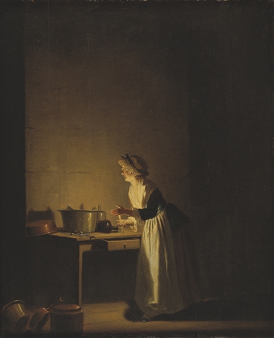 Köksscen. Kvinna med ljus i handen.