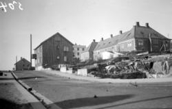 Bilde fra Gomagta med Freiveien til høyre. Branntomten til h