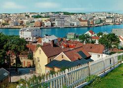 Postkort ";T-B-11"; fra Innlandet med bebyggelse hvor vi ser