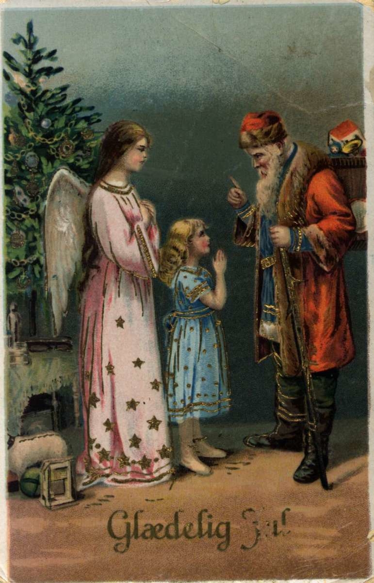 Julekort. Jule- og nyttårshilsen. En formanende julenisse og en liten pike. Engel ved siden av piken. Juletre i bakgrunnen. Datert 1924.