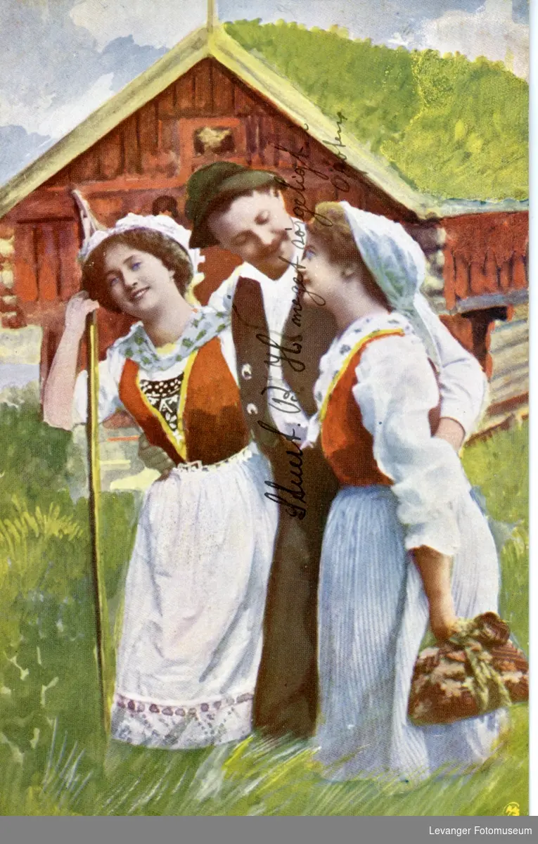 Postkort  to kvinner og en mann i festdrakter.