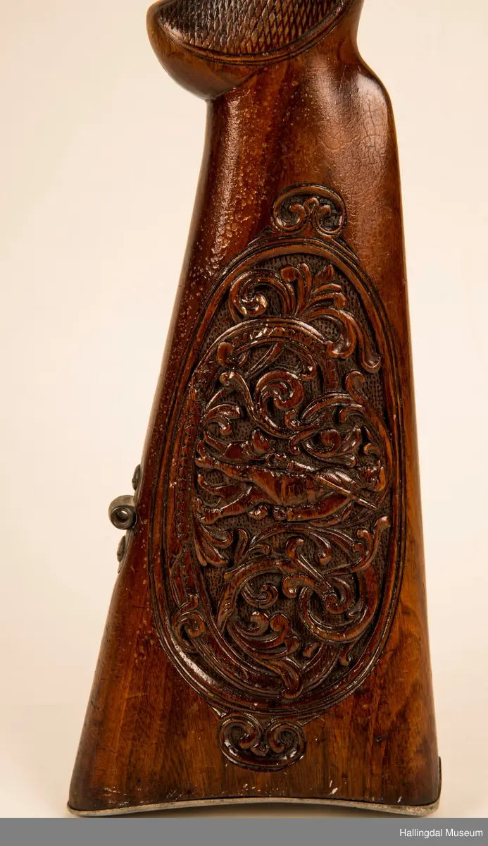 Utskjært motiv: Jeger med hund.