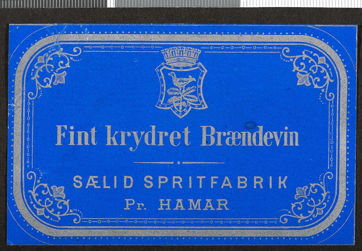 Spritetikett. Fint Krydret Brændevin, Sælid Spritfabrik, pr Hamar