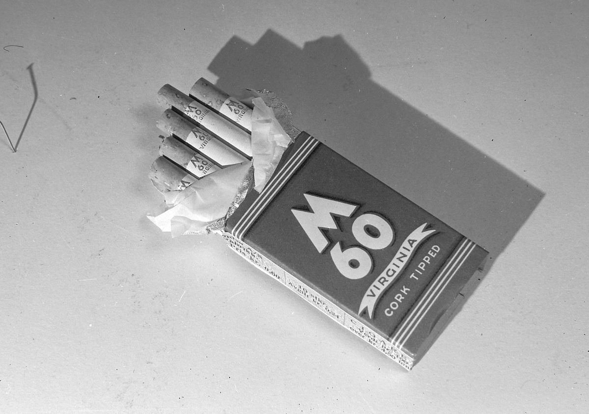 M 60 Virginia sigaretter. Reklame for T.G. Melandsø Cigarettfabrik