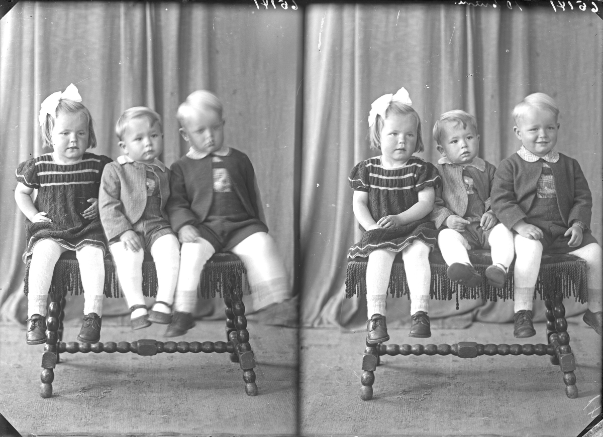 Portrett. Familiegruppe på tre. Tre barn. En liten pike og to små gutter.  Bestilt av Johs. Aalvik. Sand i Ryfylke.