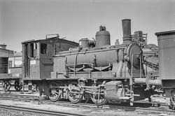 Hensatt damplokomotiv type 25e nr. 487 ved lokomotivstallen 