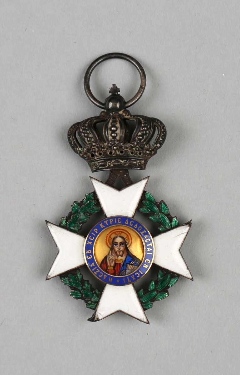 Medalje med motiv av helgenbilde på forside og hvitt kors på bakside.