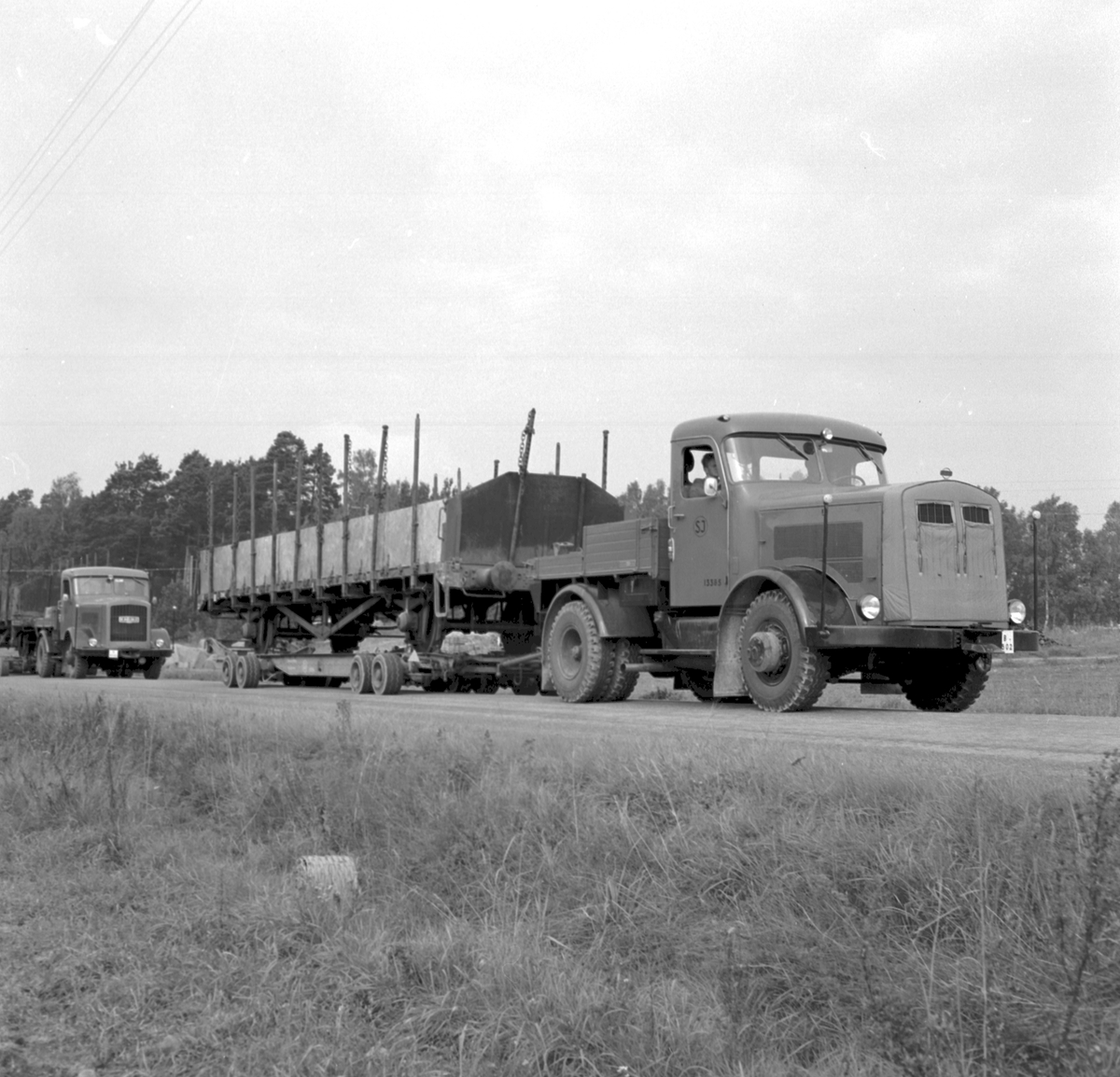 Transport av öppen godsvagn på vagnbjörn från Underås Cementgjuteri