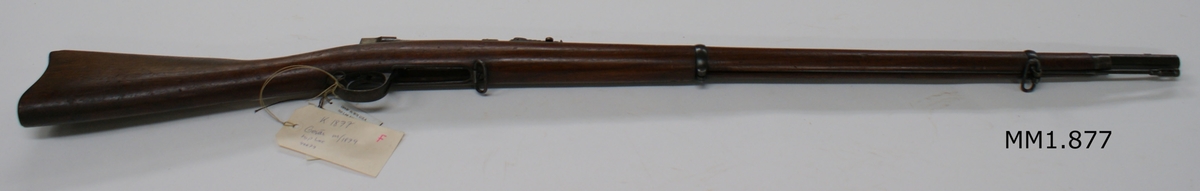 Gevär, amerikanska Lee, m/1879, märkt E. Remington o Sons Ilion N.Y. USA. Patent Nov 4 1879. Nr 46679. Kolven av trä, pipa och mekanism av stål. Beslagen av järn.