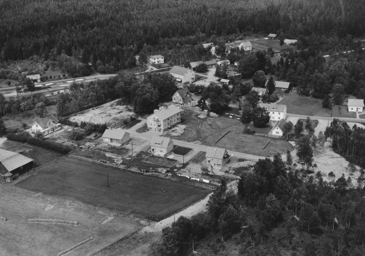 Flygfoto över Skeppshult i Gislaveds kommun, Jönköpings län. Nr 201/1956