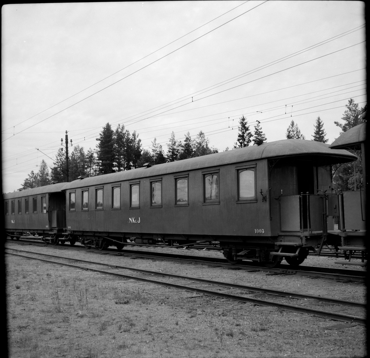 Nordmark - Klarälvens Järnväg, NKIJ personvagn 1003 på bangården i Nordmark.