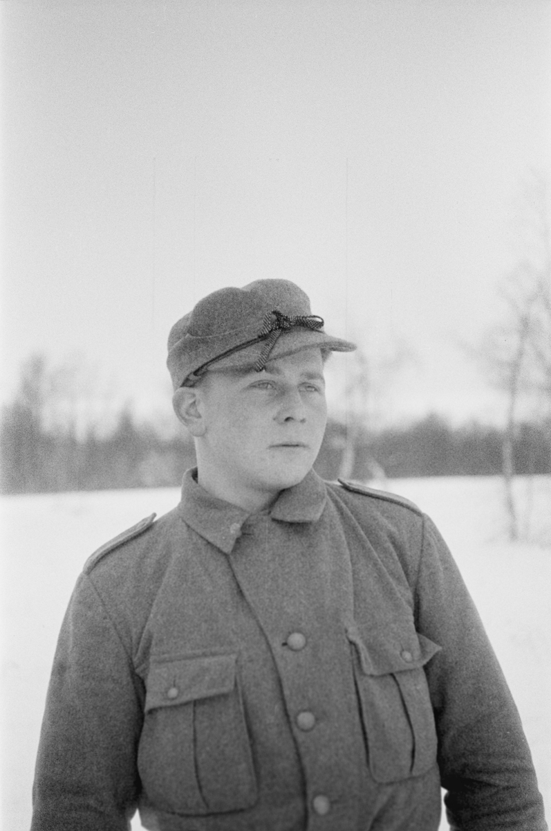Porträttfoto av Matti Heltanen, finsk frivillig under finska vinterkriget. Bild från F 19, Svenska frivilligkåren i Finland, 1940.