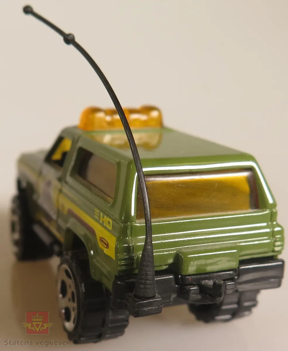 Modellbil av en Chevy Blazer, modellbilen er farget grønn.