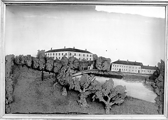 Tavla av kork med målad bakgrund, Svartån och Västerås slott.