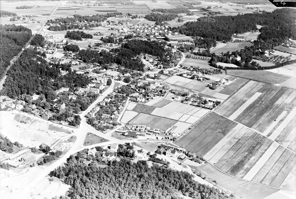 Flygfoto över Enköping med omgivande landsbygd 1936