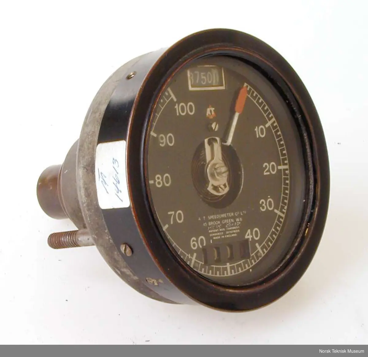 Rundt speedometer med tallskive fra 0-100 og km-teller.