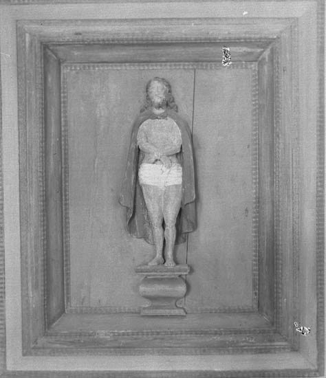 Text till bilden:"Foto av en tavla med en Kristusfigur".