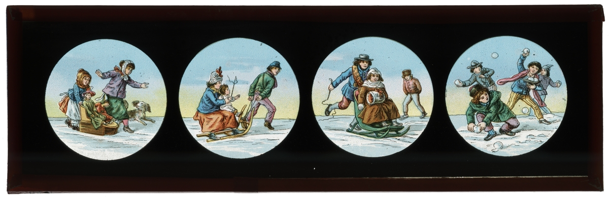 Målad bild på glas för Skioptikon/Laterna magica.
Motiv av barn, utförande olika vinteraktiviteter.