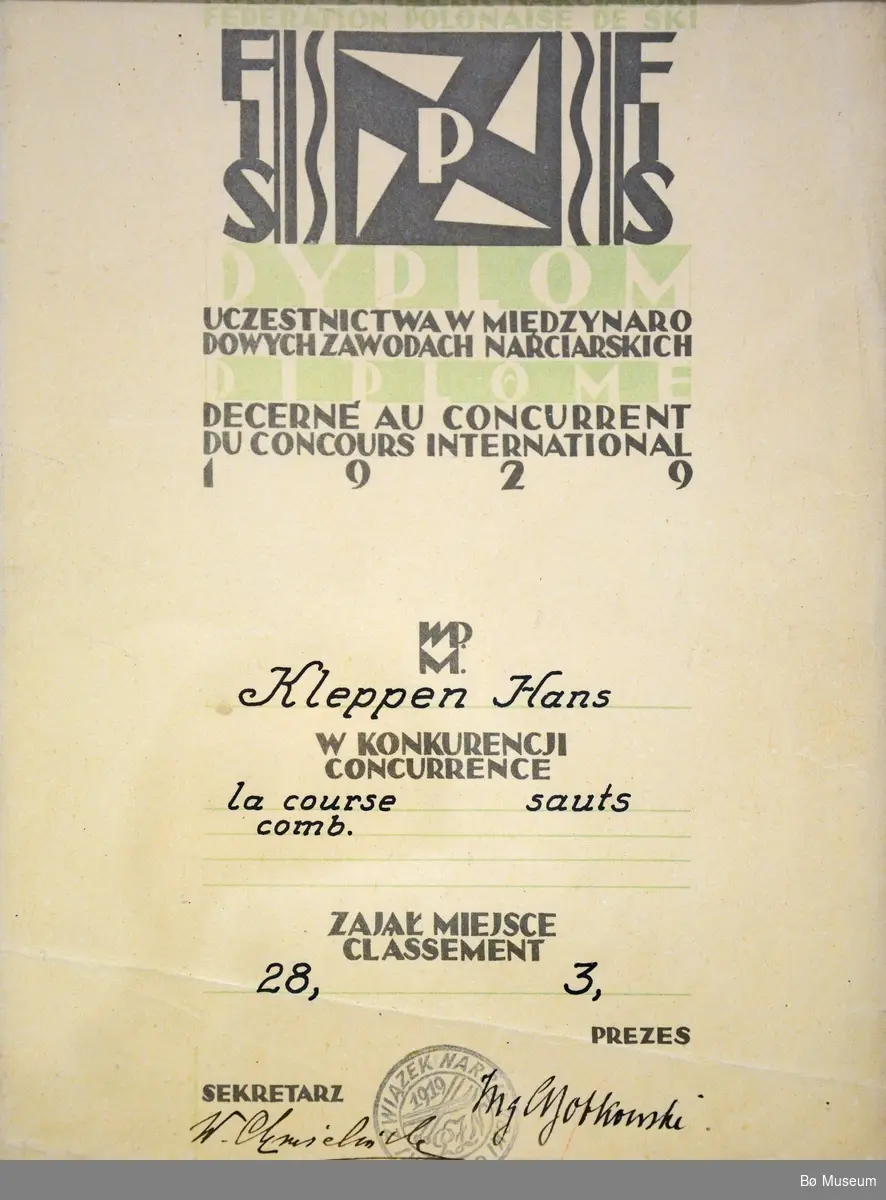 Diplom i glass og ramme. Fra VM i 1929 i Zakopane i Polen. Hopprenn. 3. plass/premie. Hører til en pokal og en medalje. Vunnet av Hans Kleppen, Bø.