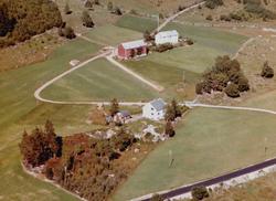 Flyfoto fra Solvang på Tingvoll. Bildet er datert 30. juli 1