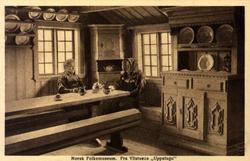 Postkort. Ylistuens "Uppstugu", to kvinner ved langbordet. T