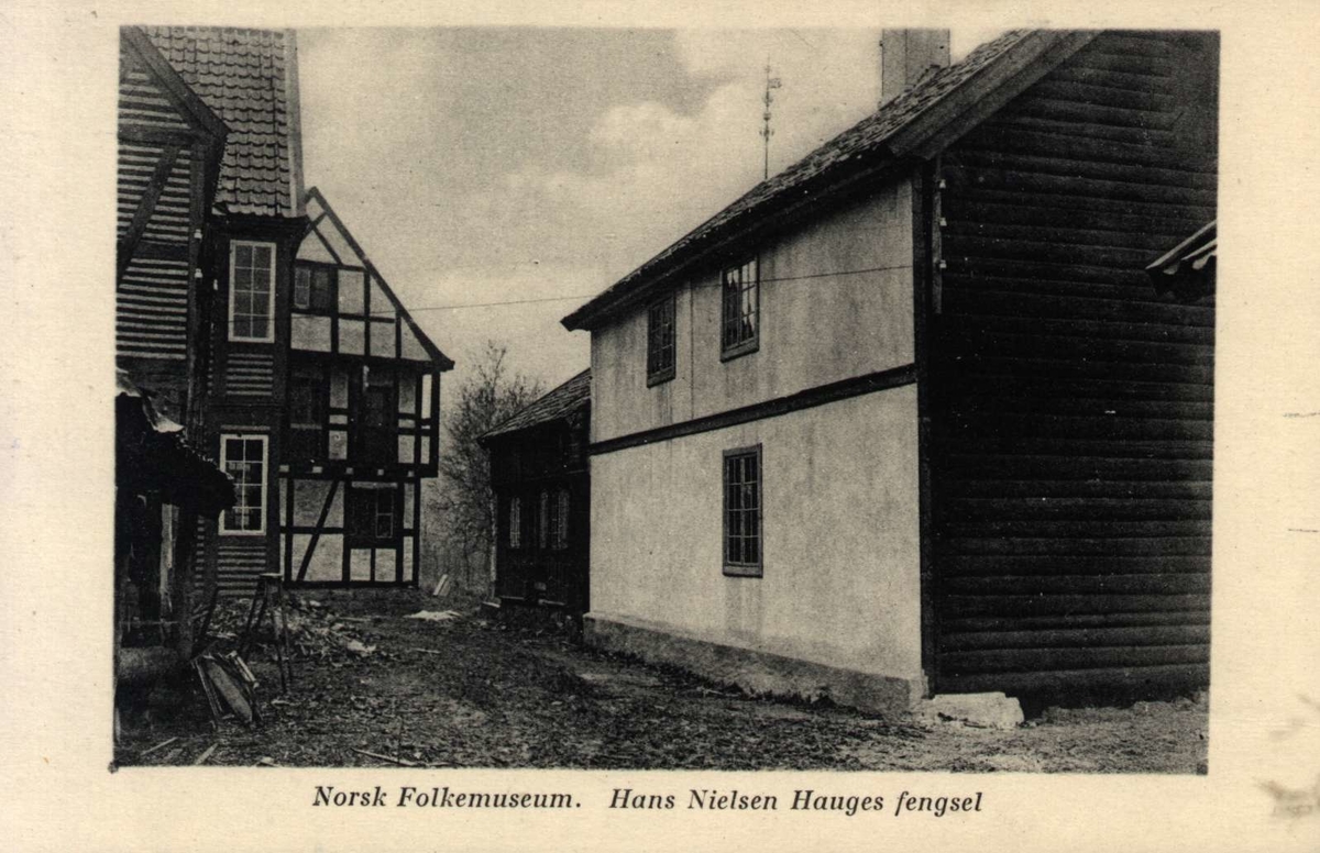 Postkort. Hans Nielsen Hauges fengsel, flyttet til Gamlebyen, østre kvartal, Norsk Folkemuseum.