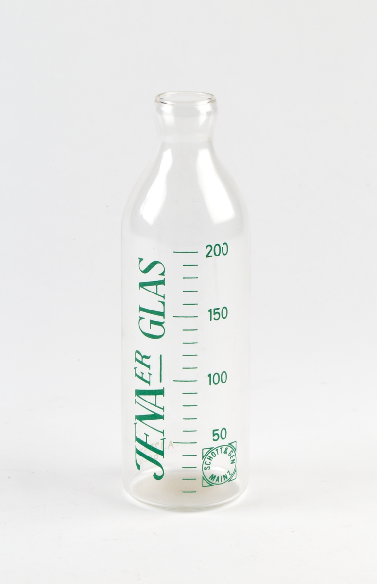 Tåteflaske i Jenaglass med gradering av volum.
