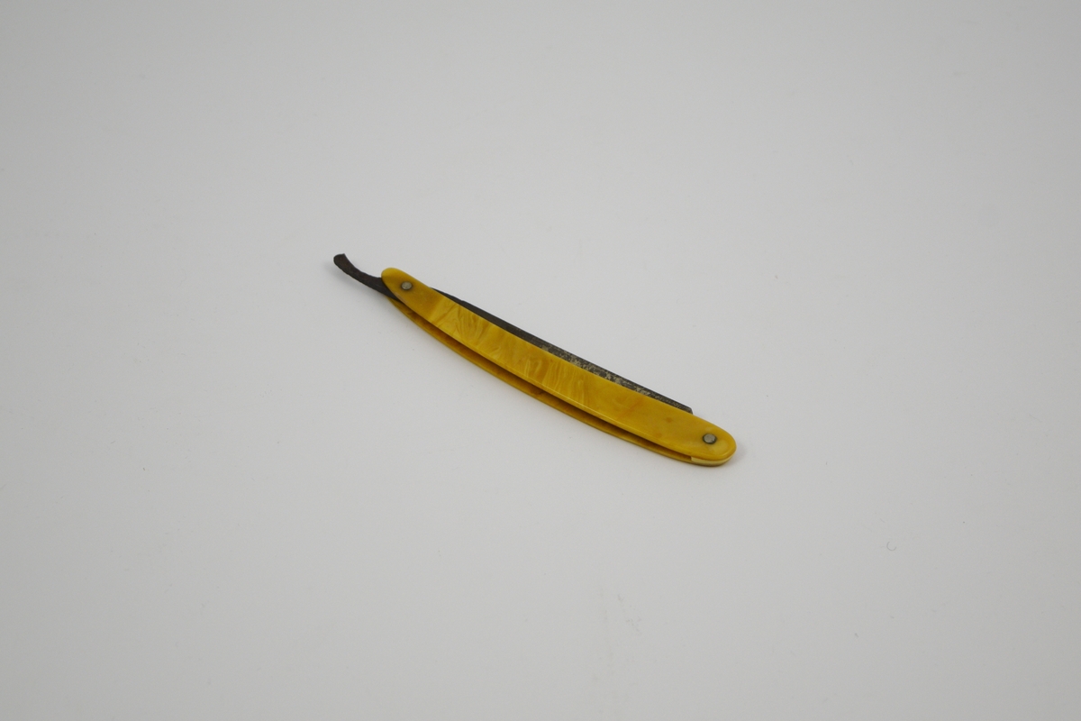 Skaftet skal illudere treverk.