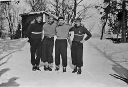 Fire menn i sportsutstyr