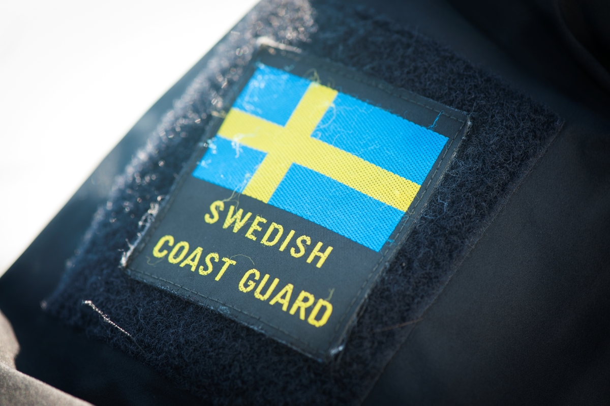 Märke på skjortärm "Swedish Coast Guard".