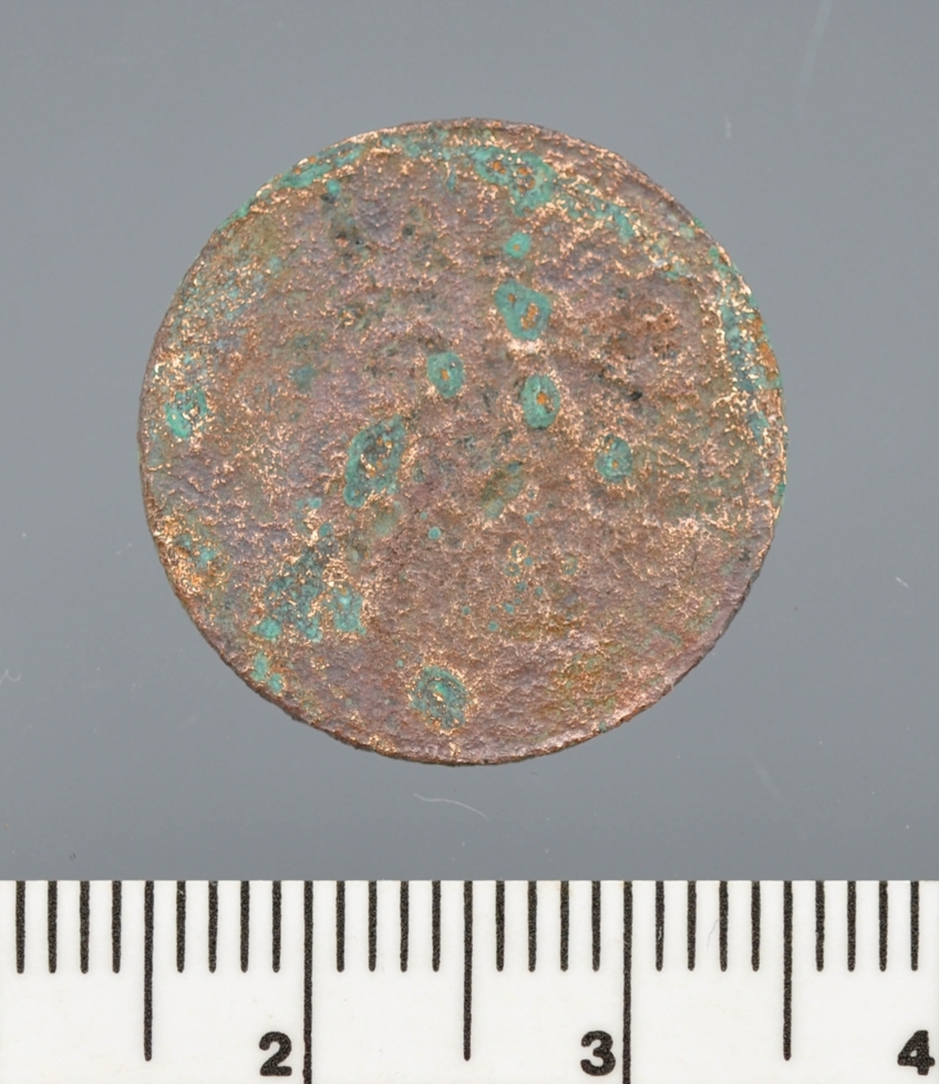 Mynt i metall funnet i Vågen i Bergen.