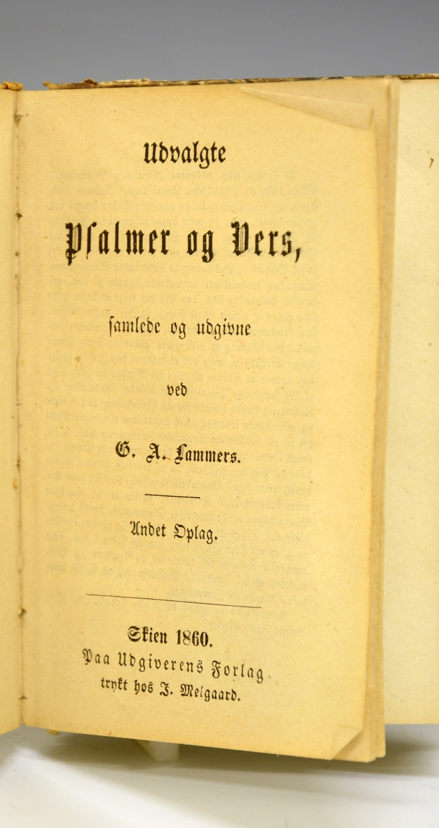 Salmebok. Fra protokollen: G.A. Lammers, Udvalgte Psalmer og Vers. Andet opl. Skien 1860. 180 s. 8vo.