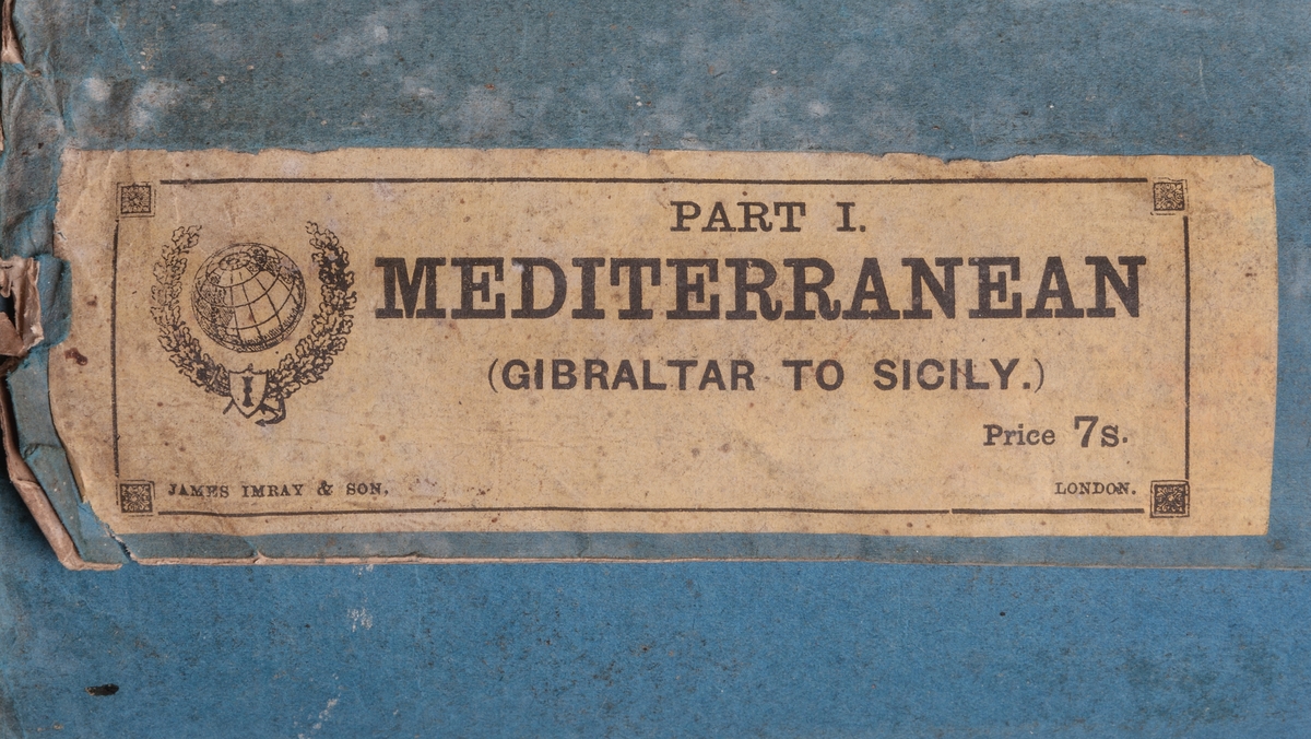 Sjökort fodrat på blå papp, föreställande Medelhavet, Mediterranean sea. Tryckt 1874.