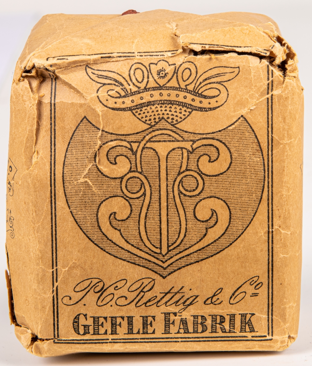 Tobakspaket, av märket: "Gefle wapen" från  Rettigska fabriken.